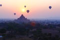 Balloons across the Bagan in sunrise